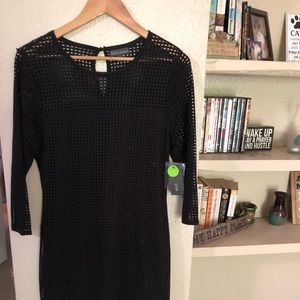Black dress, never worn, mid length